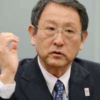 At the wheel: Toyota Motor Corp. President Akio Toyoda speaks in a recent interview. | KYODO