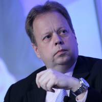 Bullish on China: Andy Palmer, executive vice president of Nissan Motor Co., speaks during a Bloomberg-organized financial conference in New York in April 2011. | BLOOMBERG
