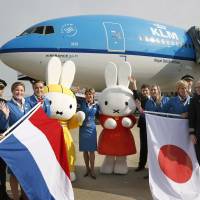Dutch connection: Cabin and ground crew members of KLM Royal Dutch Airlines pose with Miffy mascots Thursday morning at Fukuoka Airport after the carrier\'s first direct flight there arrived from Amsterdam. | KYODO