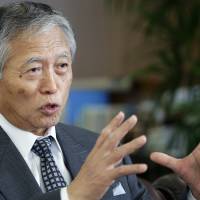 On a sushi roll: Ikuya Oneda, president of Suzumo Machinery Co., is interviewed Thursday in Tokyo. Sushi machine maker upbeat about yen's fall, high overseas demand