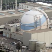 Nothing to see here: Reactor 3 of Kyushu Electric Power Co.\'s Genkai nuclear plant in Saga Prefecture is seen in June. | KYODO