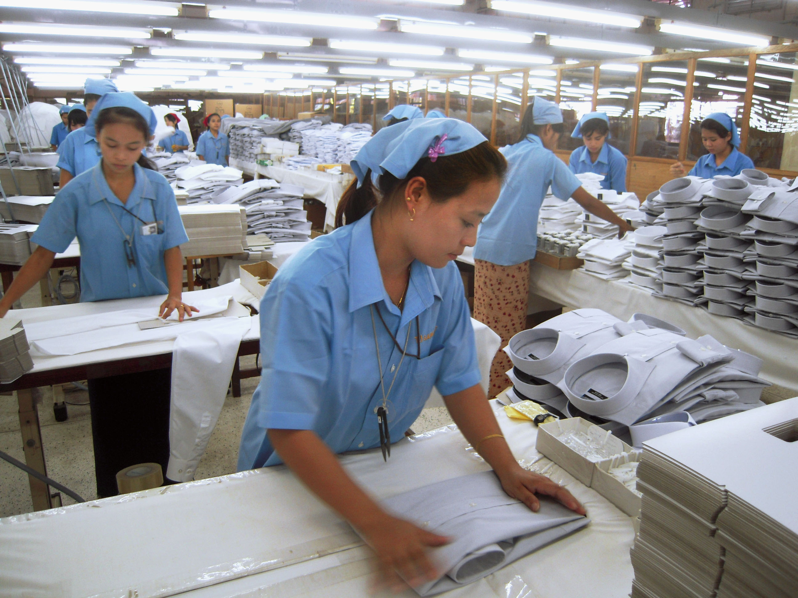 Offshore presence: Women work at a Japanese garment factory in Mingaladon Industrial Park in Yangon, Myanmar, last December. | KYODO