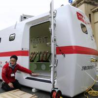 Use in an emergency: A prototype floating tsunami shelter made of fiber-reinforced plastic is shown to the media Thursday at the Shizuoka Prefectural Government offices. The product, manufactured by race car company Tajima Motor Corp., can accommodate up to 20 people. | KYODO