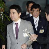 Constitutional cooperation?: Nippon Ishin no Kai (Japan Restoration Party) leaders from Osaka, Toru Hashimoto (left) and Ichiro Matsui, leave the prime minister\'s office Tuesday evening after meeting with Prime Minister Shinzo Abe. | KYODO