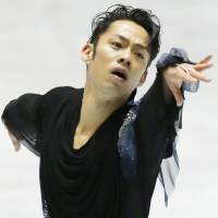 Take one for the team: Daisuke Takahashi performs during the World Team Trophy on Thursday. | KYODO