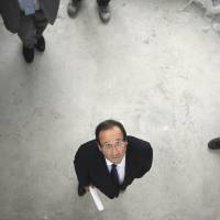 Eye on transparency: Francois Hollande campaigns for the Socialist Party\'s primary elections in May 2011 in Dijon, France. Under a new transparency policy, Hollande on Monday released details about the personal wealth of all 38 members of his government. | AFP-JIJI