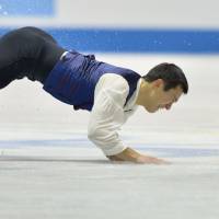 Tough break: Canada\'a Patrick Chan falls during his performance in the men\'s free skating event at the World Team Trophy at Yoyogi National Gymnasium on Friday. | AFP-Jjji