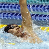 Making a splash: Kosuke Hagino wins the men\'s 100-backstroke title at the national championships on Friday in Nagaoka, Niigata Prefecture, completing the race in 53.10 seconds. | KYODO