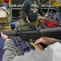 Down a barrel: Maryland\'s gun-control bill bans assault weapons and broadens curbs on purchases by the mentally ill. | BLOOMBERG