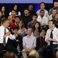 Political ambitions: U.S. President Barack Obama and Facebook CEO Mark Zuckerberg discuss the national debt at a townhall meeting on April 20, 2011. | AP