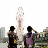Odaiba\'s Ferris wheel was definitely not the main attraction this morning. | Mads Berthelsen