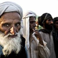 On the margins: Members of the Baloch Bugti tribe who were evicted from their villages during the regime of former military ruler Pervez Musharraf rally Monday in Islamabad to demand a return to their towns and take part in Pakistan\'s May 11 election. | AP