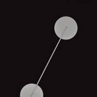 Bright and simple: The Artemide \"ITIS\" desktop light, designed by Naoto Fukasawa and photographed by Tamotsu Fujii | &#169;TAMOTSU FUJII, COURTESY OF 21_21 DESIGN SIGHT