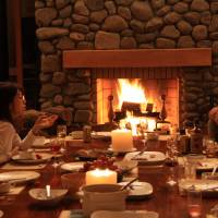 Warmth and heat: Trust members chat over dinner at our new Afan Centre. | C.W. NICOL PHOTO