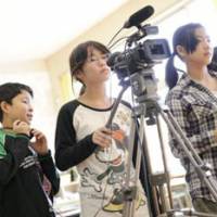 Rated PG: Children learn the basics of making movies in the documentary \"Ima Tsutaetaikoto: Kitto Waraeru.\" | PHOTOSCOURTESY OF THE FILMMAKERS