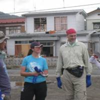 Helping hands: Wolfgang Krueger (third from left), general manager of the Shangri-La Hotel Tokyo, in Ishinomaki with other volunteers from the hotel on Tuesday. | STEPHEN MANSFIELD PHOTO