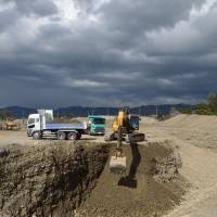 A former paddy field outside Matsumoto in Nagano Prefecture where gravel extraction is in full swing. | WINIFRED BIRD