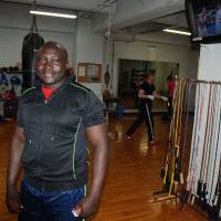 Packing a punch: Geoffrey Ima, originally from Uganda, poses at the Chunichi Boxing Gym in Nagoya, where he works as a trainer. Uganda boxing trainer gives expert advice to aspiring pugilists