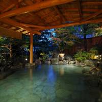 Sublime: Part of the charming rotenburo (open-air hot-spring bath) beside the Tone River at the venerable Tatsumi-kan Inn. | COURTESY OF RANDY CHANNELL