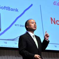 Counterpunch: Softbank President Masayoshi Son holds a press conference in Tokyo Tuesday. | AFP-JIJI
