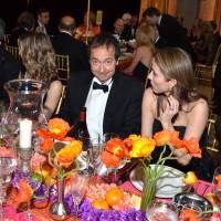 Happier times: Billionaire John Paulson (center) attends dinner during the School of American Ballet Winter Ball in New York in March. Paulson’s bet on gold took a downturn recently, costing him nearly $1 billion during a two-day period. Hedge fund guru John Paulson fleeced by gold