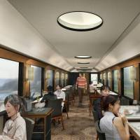 Fast food: Models dine in a mockup of a JR East restaurant train that will debut this fall in the northeast. | JR EAST / KYODO