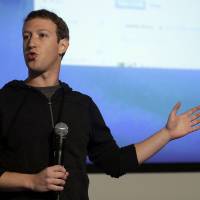 Sticking with it: Facebook CEO Mark Zuckerberg speaks at Facebook headquarters in Menlo Park, California, on Jan. 15. | AP