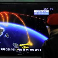 Telemetry lesson: A man watches a  TV screen broadcasting news of North Korea\'s rocket launch at a railway station in Seoul on  Wednesday. | AFP-JIJI