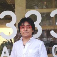 Engage: Shigeki Matsuura, editor-in-chief of Huffington Post Japan, poses outside the company\'s office in Tokyo on April 15. | AYAKO MIE