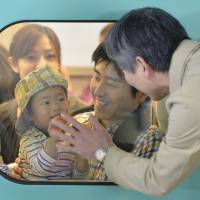 Homeward bound: A boy and his father say goodbye to a relative Sunday before their bullet train departs from JR Sendai Station. Holidaymakers crowded trains, planes and automobiles as the Golden Week holidays started coming to an end. | KYODO