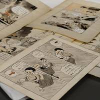 Missing pieces: Cartoonist Leiji Matsumoto\'s sheets of unpublished comic strips created by the late artist Osamu Tezuka are displayed. | KYODO