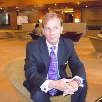 The good fight: Mark Dybul of the nongovernment organization Global Fund to Fight AIDS, Tuberculosis and Malaria is interviewed Friday in Tokyo. | TOMOHIRO OSAKI