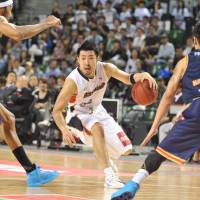 Drive and dedication: Yokohama\'s Masayuki Kabaya moves the ball during the B-Corsairs\' 101-90 win over the Rizing Fukuoka in the bj-league championship game at Ariake Colosseum on Sunday. | YOSHIAKI MIURA