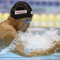 Winning technique: Decorated Olympian Kosuke Kitajima competes in the men\'s 100-meter breaststroke at the Japan Open on Friday in Sagamihara, Kanagawa Prefecture. | KYODO