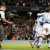 Coming out: Manchester City plays Liverpool in Manchester, England, on Aug. 23, 2010. English gay footballers fear making their sexuality public. They are not sure if the fans or the game is ready for them just yet. | BLOOMBERG