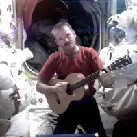Star man: Chris Hadfield records the first music video from space on Sunday. | AP