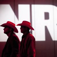 Name of the game: National Rifle Association members listen to speakers during the Annual Meeting of Members on May 4 in Houston. | AP