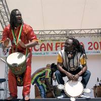 Percussionists perform at the African Festa 2013, held on the occasion of TICAD V, in the conference\'s host city of Yokohama last month. | CITY OF YOKOHAMA