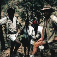 Active duty: Young Nic (right) on patrol while serving as a Game Warden in the Simien Mountains of northern Ethiopia in the late 1960s. The man on the left, with a rifle slung over his shoulder, was Assistant Warden Mesfin Abebe, and the two men behind were local vigilantes who joined us in pursuit of illegal loggers. | C.W. NICOL PHOTOS