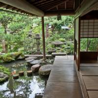 The porch off the drawing room, with carp enjoying the stillness of a pool in the stream that it overlooks. | STEPHEN MANSFIELD PHOTO