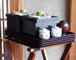 Ready to go: The cheery blossom lunches are served in stacked bento boxes. Innsyoutei