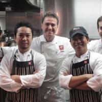 Warm welcome: Mario Frittoli (center) with his kitchen crew | STEFANIA VITI, COURTESY OF GIORGIO METERA