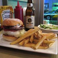 Spicy: The Cajun Lamb Burger at Eat, with a side order of fresh-made fries. | ROBBIE SWINNERTON PHOTOS