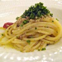 Fragrant flavors: A pasta course at Aroma Fresca featuring  watarigani  crab, fresh tomato and scallions. | ROBBIE SWINNERTON PHOTO