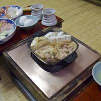 Food for thaw: One-pot cooking has for centuries helped ward off Japan\'s winter blues. The chicken sukiyaki course at venerable Kanda eatery Botan is a tasty example of this, featuring various types of chicken plus tofu, vegetables and noodles, cooked at your table over a comforting flame. | ROBBIE SWINNERTON PHOTOS