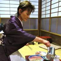 Dressing the part: Botan\'s kimono-clad waitresses hint at the restaurant\'s history . it has served sukiyaki for over a century. | ROBBIE SWINNERTON