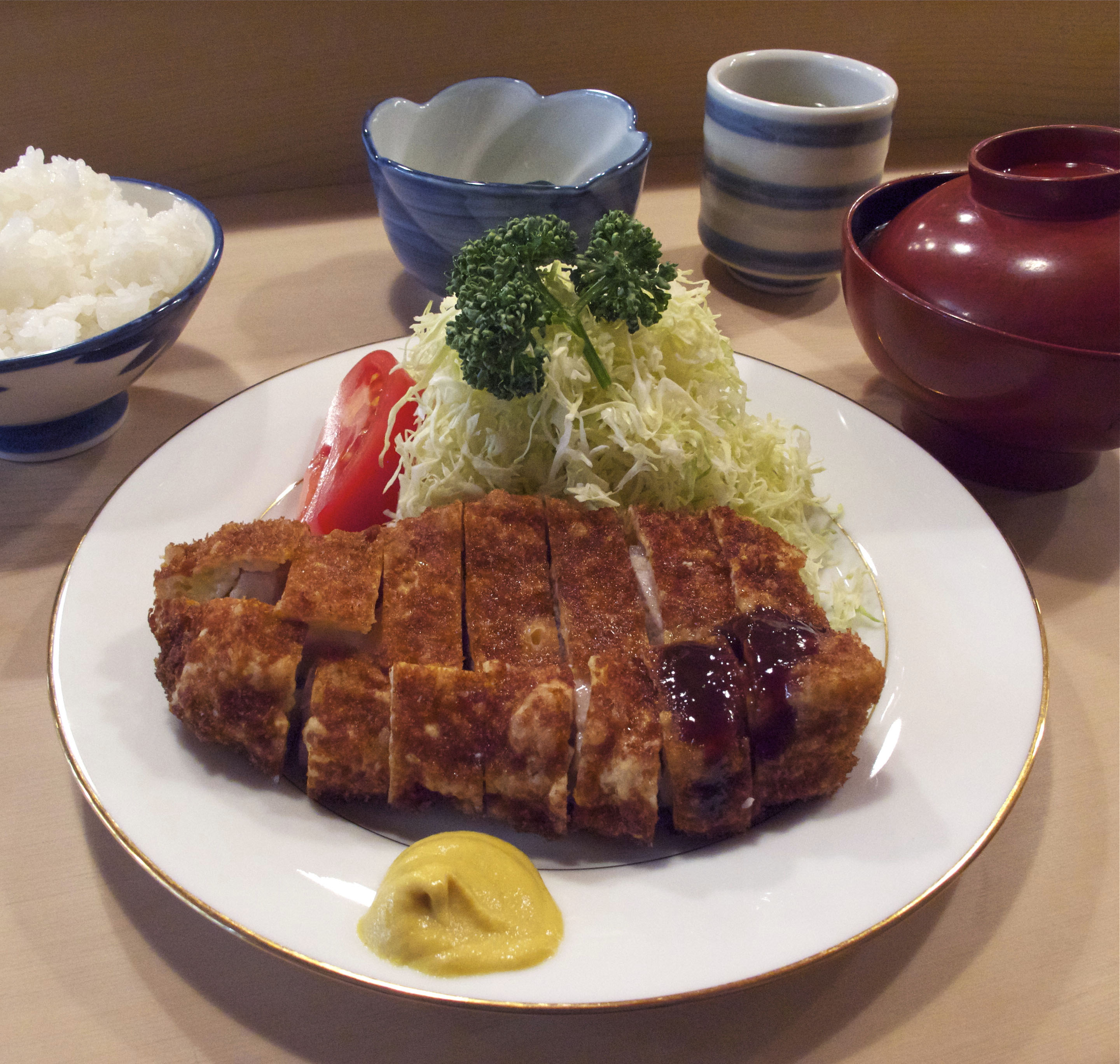 Katsu cradle: Tonki has prepared its distinctive tonkatsu (deep-fried breaded pork cutlets) since 1939. The cutlets are deep-fried slowly and taste more home-cooked than those at other more modern restaurants. | ROBBIE SWINNERTON PHOTOS