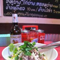 Some like it hot: The food at Montee is as spicy as you\'d hope from authentic Thai, and the restaurant itself pushes the mercury too &#8212; note the industrial fan in the doorway. Inset above: Thai-style savory pancake topped with seafood and bean sprouts. | T. SAWAGUCHI PHOTO