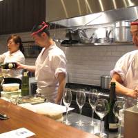 Counter crew: Gallus grillmaster Tomohiko Abe (right) and chef Yasunori Yamamoto (center) prepare yakitori with a twist. Gallus: Torishiki spinoff is a chick of the same feather