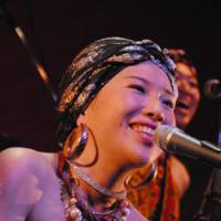 Out of Africa: Eriko Mukoyama, whose stage name of Anyango means \"girl born in the morning,\" sings a song in Dholuo, the language of Kenya\'s Luo tribe, at a Tokyo concert in October 2009. | MISA INAGE PHOTO